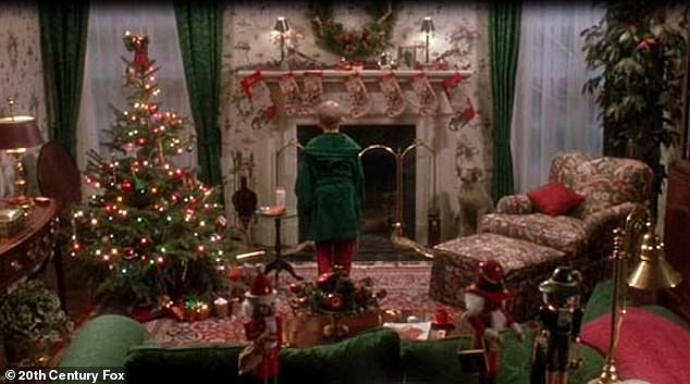 Too much: In addition to the Christmas decorations, the inside of the home features red and green furnishings, wallpaper, tile, and homeware 