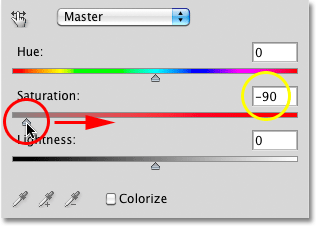Dragging the Saturation slider towards the right to restore some of the original color in the photo. Image © 2010 Photoshop Essentials.com