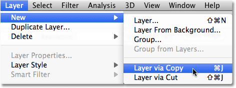 Selecting New Layer via Copy from the Layer menu in Photoshop.